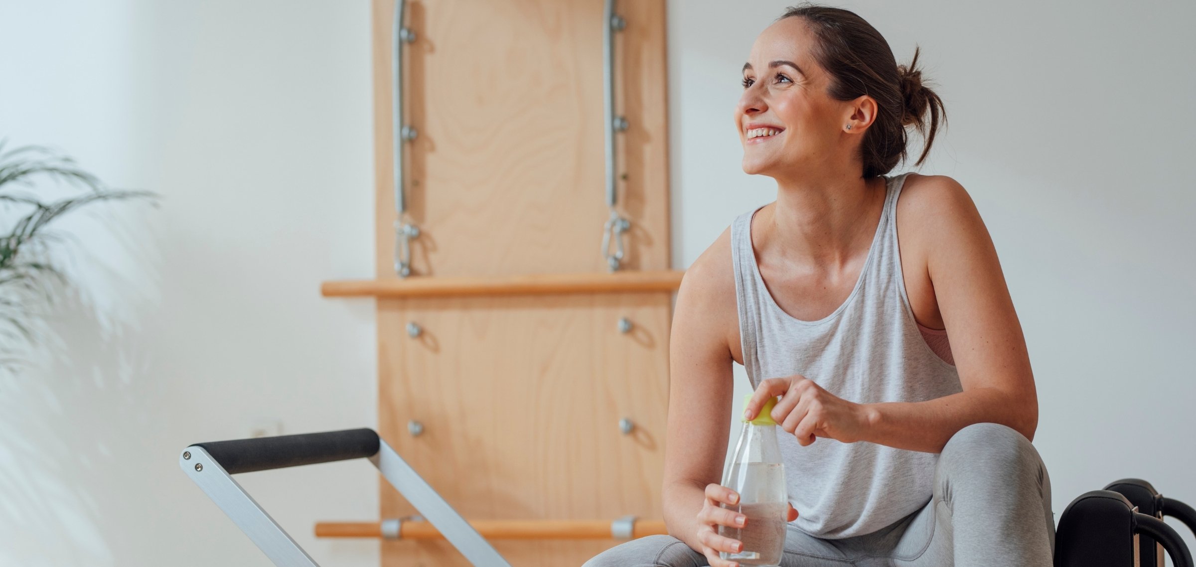 Pilates Trainerin, die ihr eigenes Pilates Studio eröffnen möchte